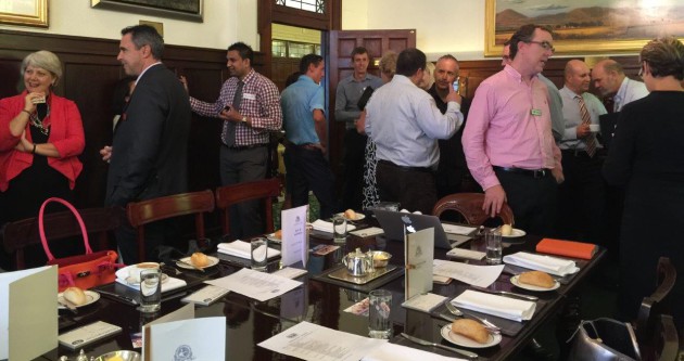 Group of people networking over breakfast